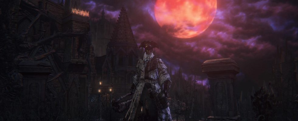 Image of bloodied man wearing a tricorn hat and priestly clothes with a blood moon in the sky in Bloodborne.