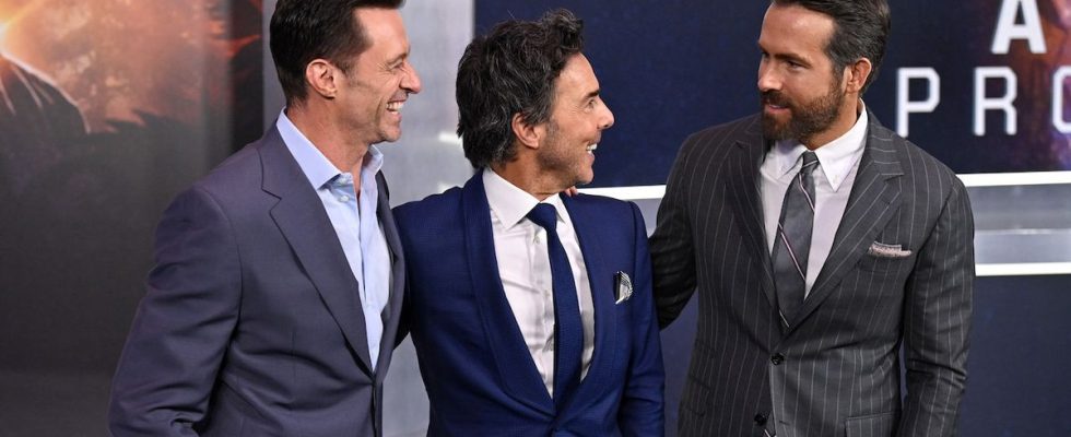 Reynolds, Levy, and Jackman on the red carpet