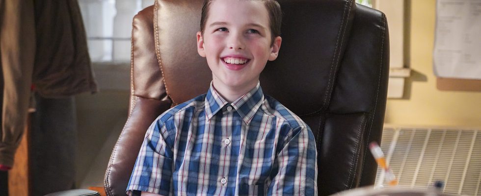 An image of Young Sheldon sitting at a desk in a leather chair. The image is part of an article on if Young Sheldon is getting a skin in Fortnite.