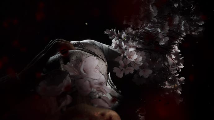 Silent Hill La capture d'écran du message court.  Une créature bizarre, liée par du fil de fer et apparemment construite à partir de fleurs de cerisier, surgit des ténèbres pour vous.