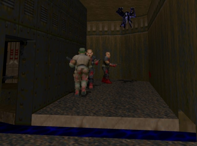 Des monstres de Doom 2 se promènent avec un Aliens Xenomorph sur le toit.