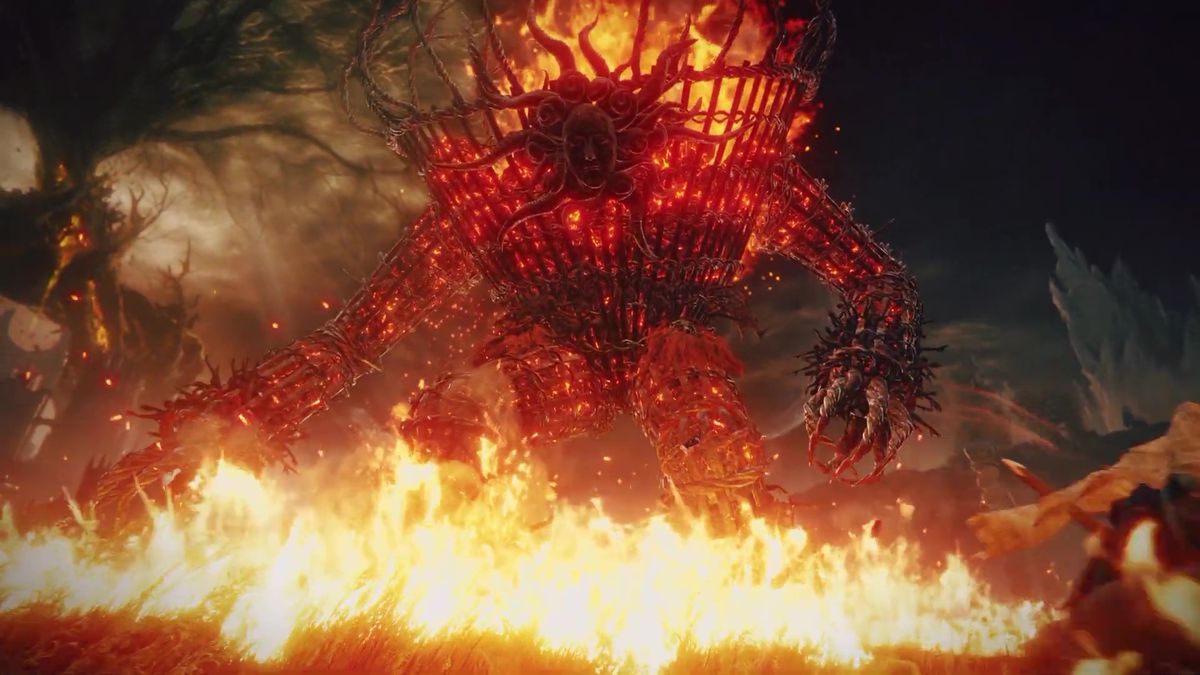 Une image d'un monstre géant enflammé dans la bande-annonce d'Elden Ring : Shadow of the Erdtree. Il ressemble presque à un énorme paquet de bâtons humanoïdes qui ne font qu'un seul feu et se promènent.  Il dispose également d'un masque pour le visage. 