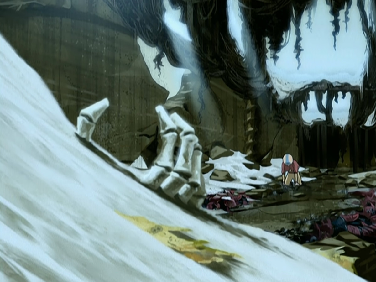 Aang s'effondre au sol dans les ruines du Temple de l'Air Austral