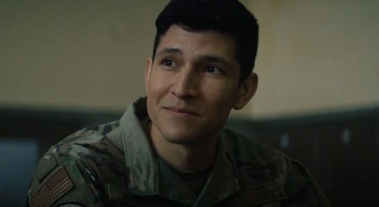 Danny Ramirez smiling in uniform in The Falcon and the Winter Soldier.