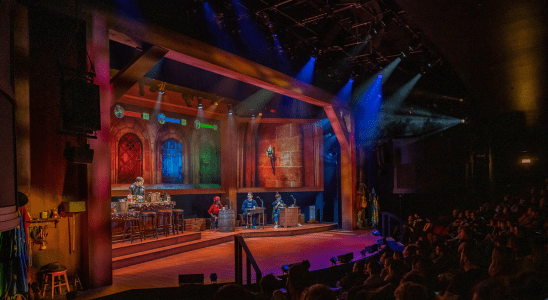 A promotional image of the Dungeons & Dragons: The Twenty-Sided Tavern live play and stage show.