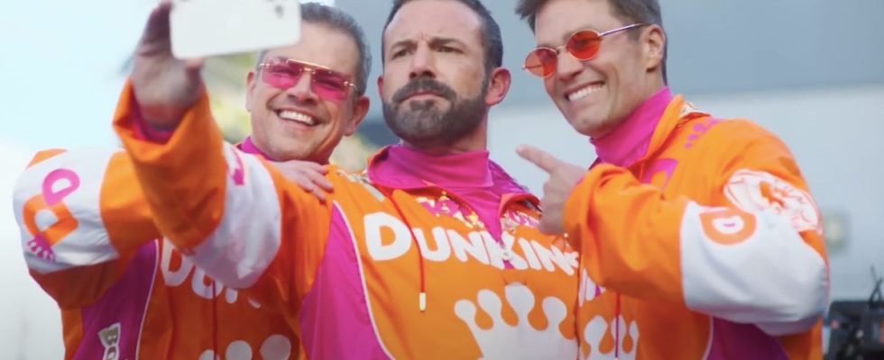 Matt Damon, Ben Affleck, and Tom Brady taking a selfie in Dunkin