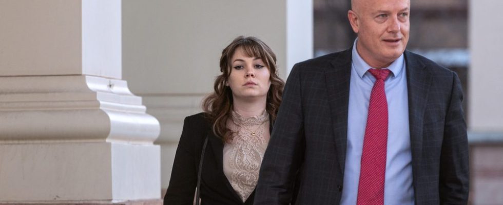 Hannah Gutierrez-Reed, left, with her attorneys Jason Bowles, leaves First District Court, Wednesday, February 21, 2024. The trial for Gutierrez-Reed, who was working as the armorer on the movie "Rust" when a revolver actor Alec Baldwin was holding fired killing cinematographer Halyna Hutchins and wounded the film’s director Joel Souza, begins Thursday morning in Santa Fe, N.M.