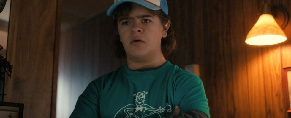 A press image of Dustin crossing his arms in Season 4 of Stranger Things.