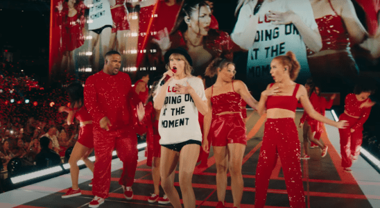 Taylor Swift performing 22 at the Eras Tour in the film