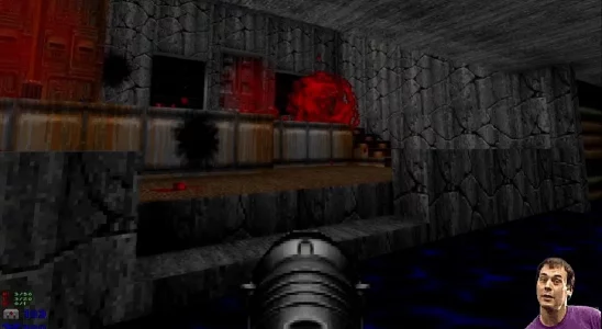 Doom 2: Dan Forden in the corner as Doom monster gets exploded from a rocket.