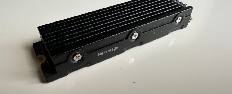 Nextorage NEM-PA Series SSD on a white tabletop with its small logo showing on its side