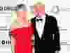 L'homme d'affaires et personnalité de la télévision Kevin O'Leary et sa femme Linda arrivent à la soirée des Oscars 2014 de la Fondation Elton John AIDS à West Hollywood, Californie, le 2 mars 2014.