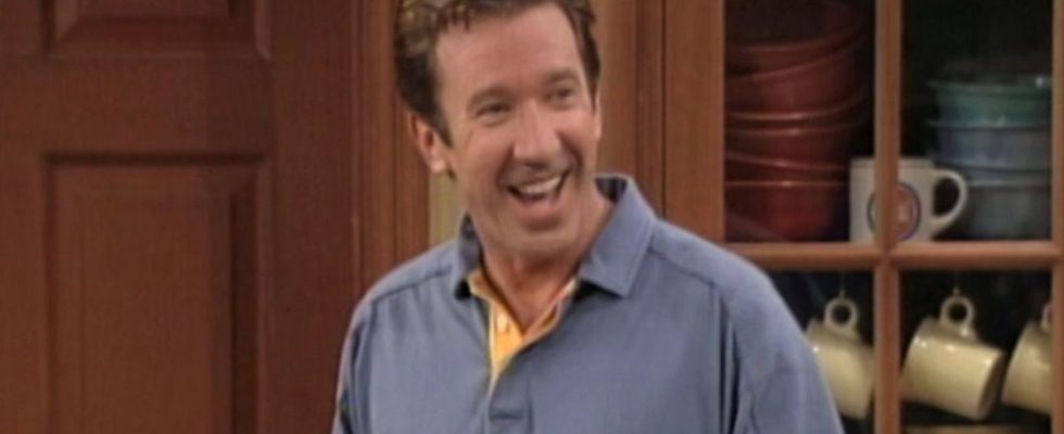 Tim Taylor smiling inside house in Home Improvement