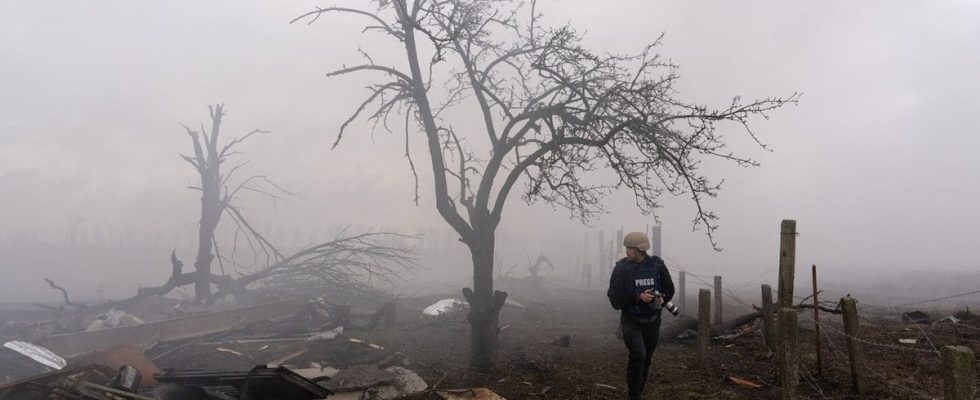 A Ukrainian press photographer surveying the Russian devastation of Mariupol