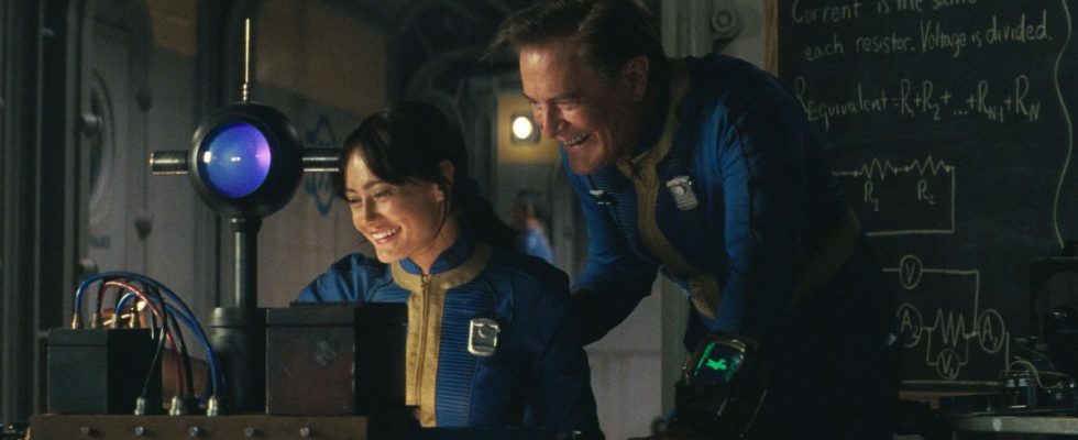 Ella Purnell and Kyle MacLachlan share a laugh around a scientific device in Fallout.