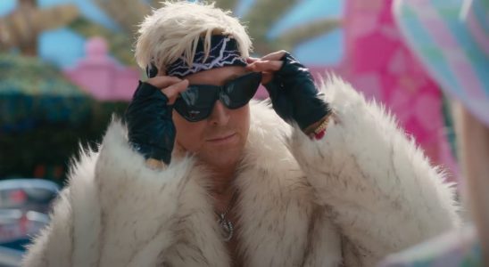 Ryan Gosling as Ken putting on a pair of sunglasses while already wearing sunglasses in the Barbie movie.