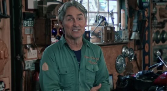 Mike Wolfe in a room full of signs and memorabilia on Season 25 of American Pickers.