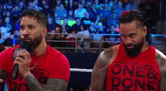 The Usos talking smack in a WWE ring.