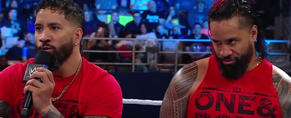 The Usos talking smack in a WWE ring.